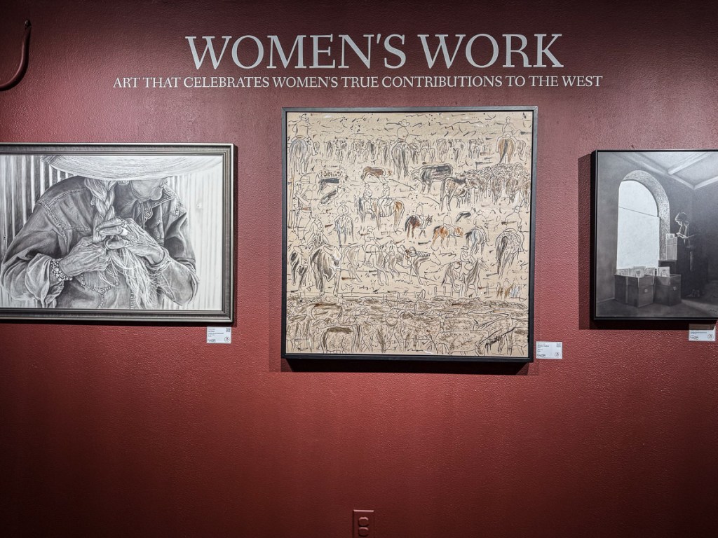 Three painting on red background with wording "Women's Work".