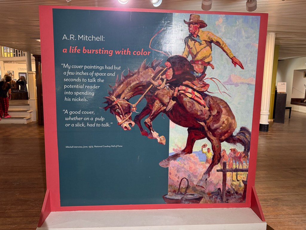Painting of bucking horse with cowboy and quote by A.R. Mitchell.