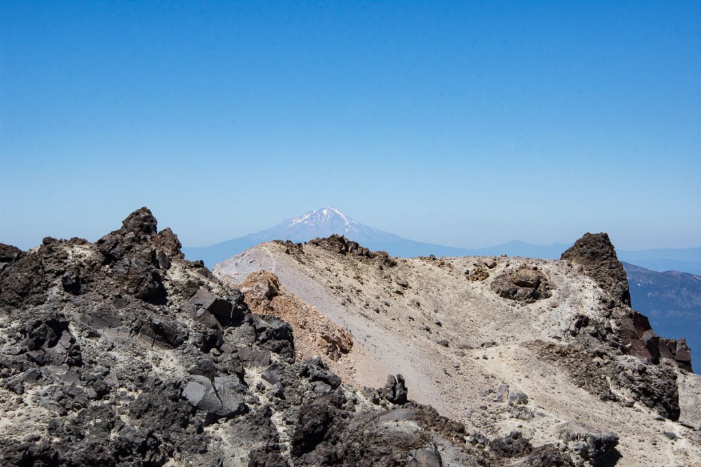 View of Mt. Shasta in the distance with Lassen Peak in foreground.